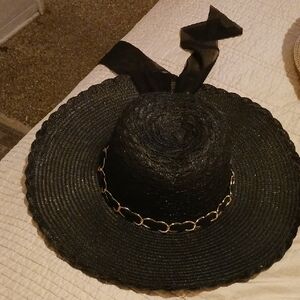 Stylish Black Hat with Gold Chain Accent